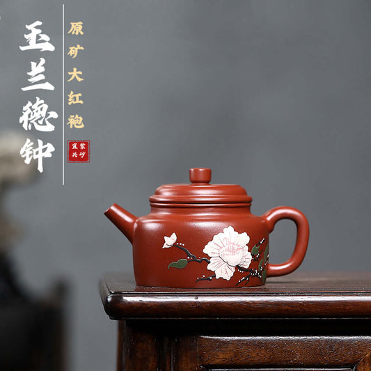 Handmade Yixing purple sand teapot featuring floral design, perfect for Kung Fu tea sets and home brewing.
