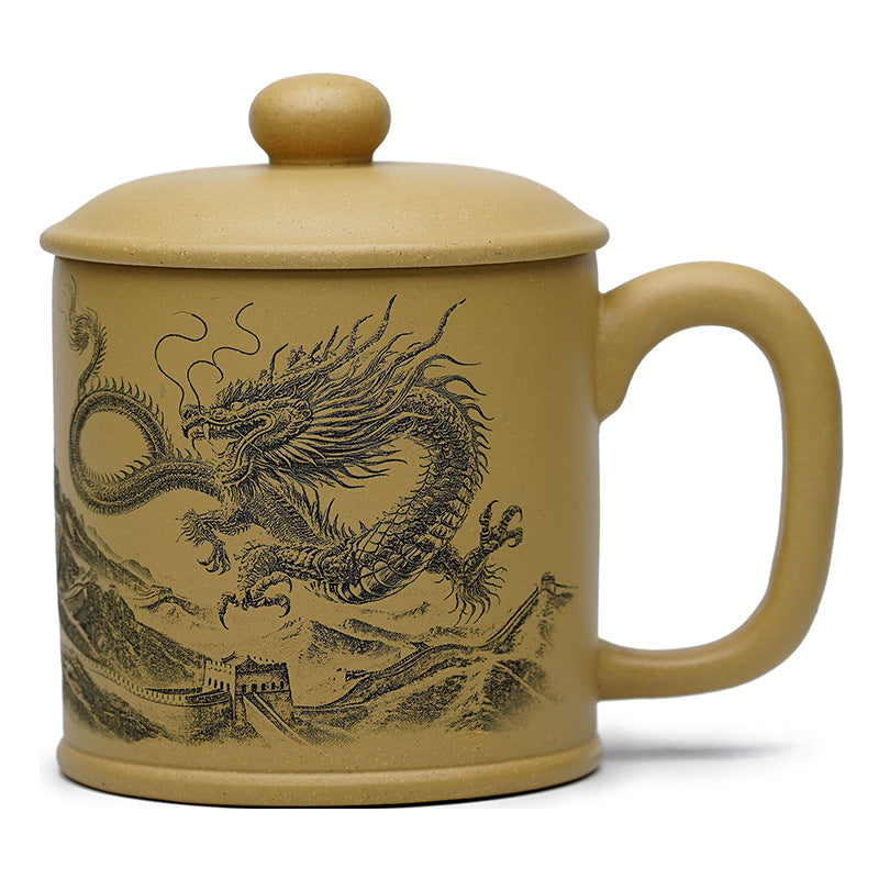 Handmade Yixing purple sand cup with dragon engraving, perfect for tea lovers and collectors.