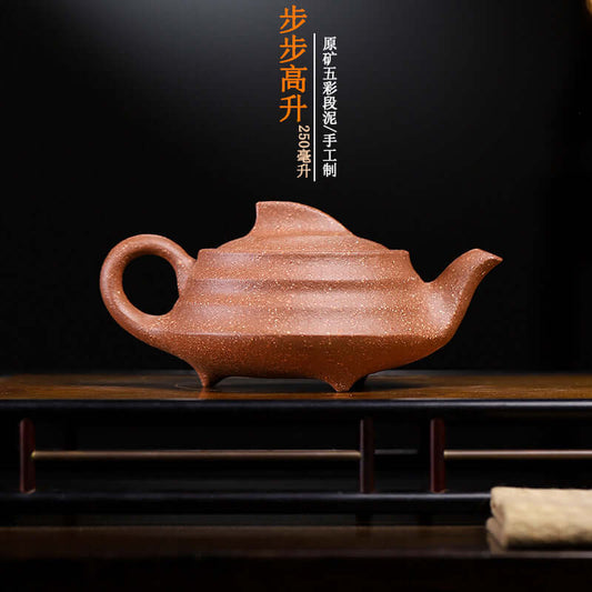 Handmade Yixing purple sand teapot showcasing unique wave design, ideal for Kung Fu tea, crafted from original clay.