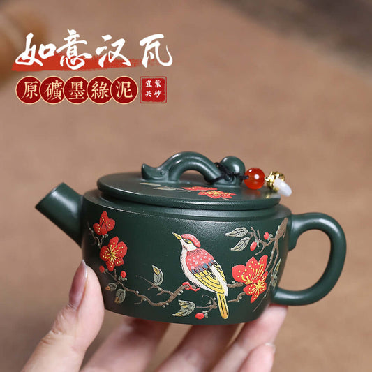 Handmade Yixing purple sand teapot with green mud and painted design, perfect for kung fu tea sets.