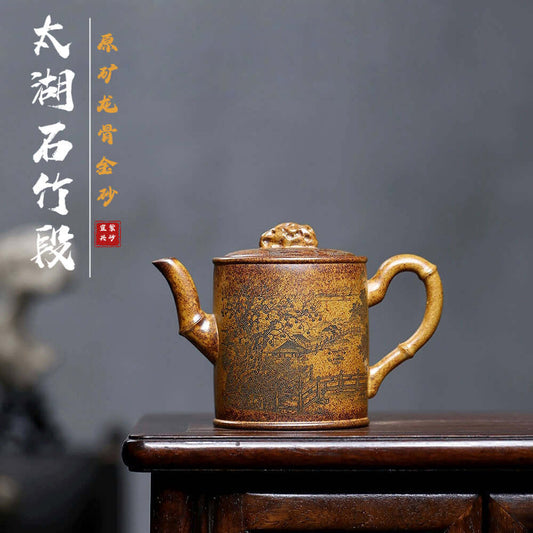 Handmade Yixing purple sand teapot with gold sand and bamboo design, perfect for kung fu tea sets.
