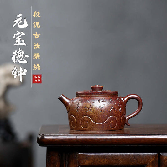 Handmade Yixing purple sand teapot with ancient inscriptions, crafted from raw ore using traditional firewood methods.