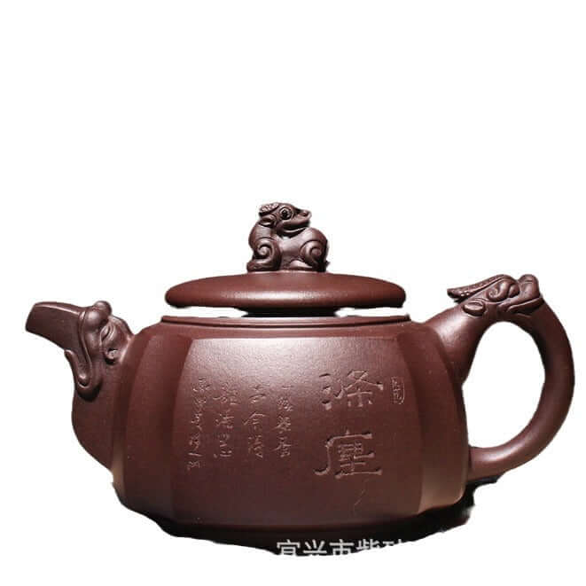 Handmade Yixing purple sand teapot featuring intricate carvings and elegant design, perfect for Kung Fu tea. Original craftsmanship.