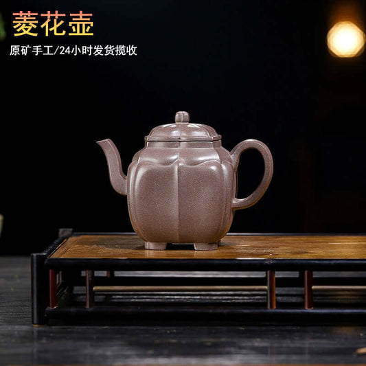 Handmade Yixing purple sand teapot with a unique design, showcasing artisanal craftsmanship and original purple sand.