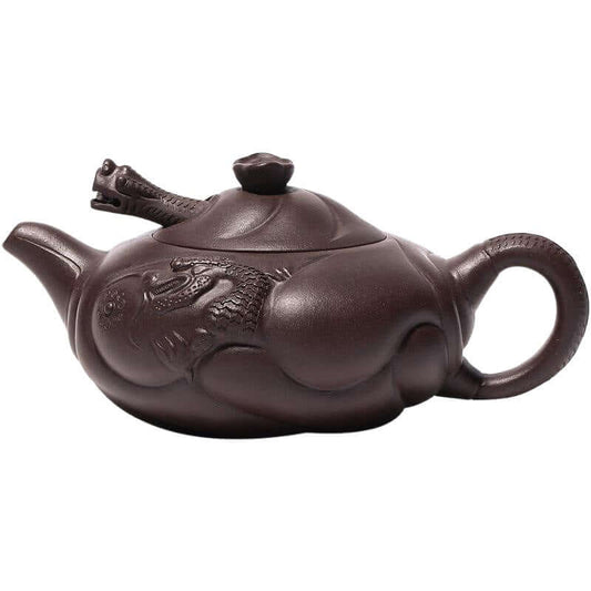 Handmade Yixing purple sand teapot featuring intricate fish dragon design, perfect for kung fu tea set.