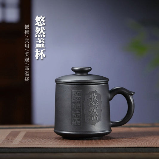 Handmade Yixing purple sand tea cup, crafted from original purple sand, perfect for tea ceremonies and gifts.