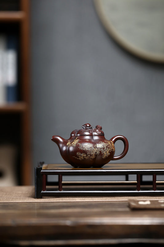 Handmade Yixing purple sand teapot crafted by an acclaimed artist, featuring intricate detailing and elegant design.