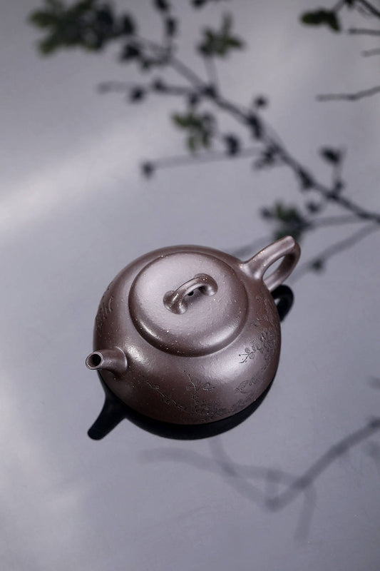 Handmade Yixing purple sand teapot, 150CC, crafted from original purple sand, artisanal design.
