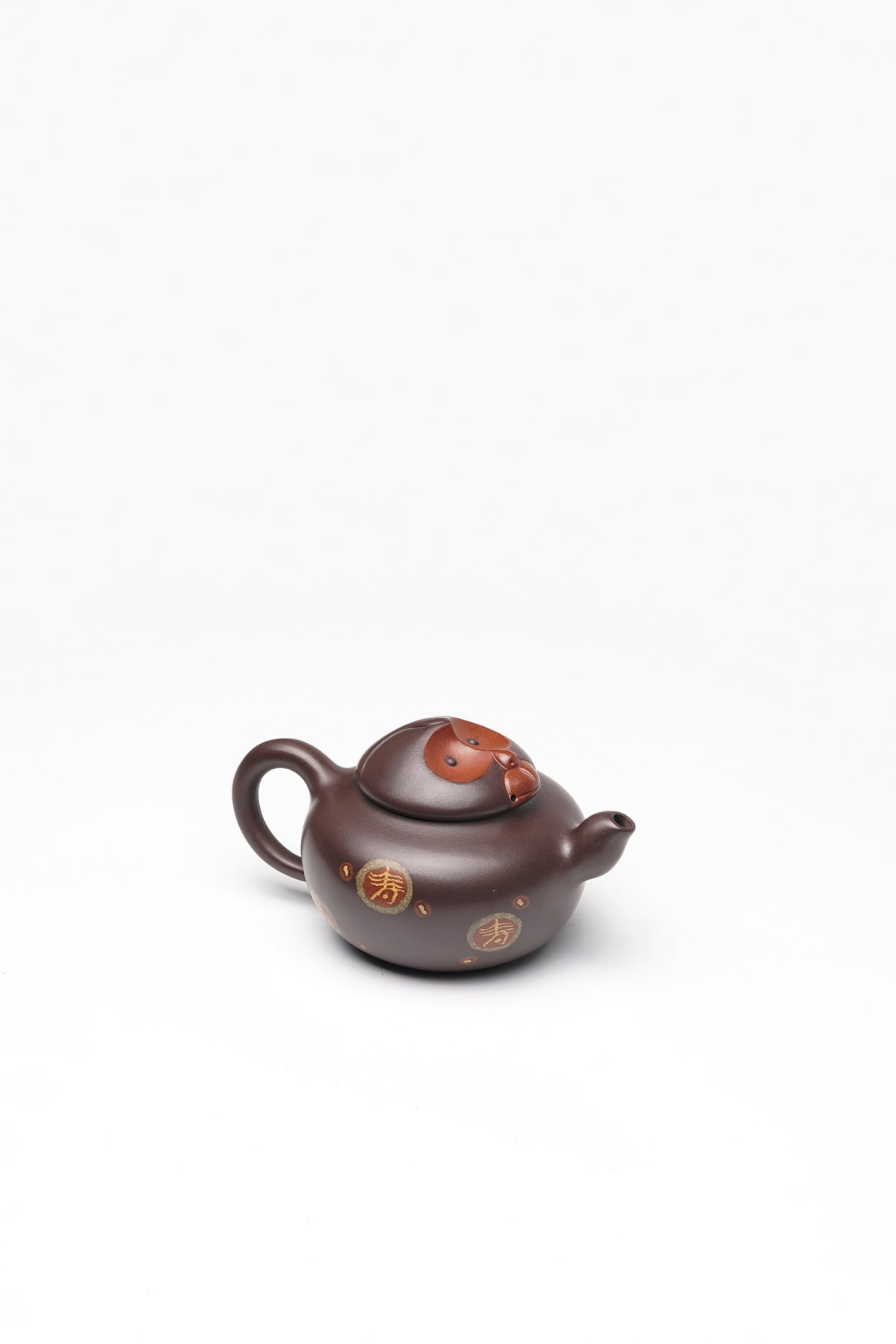 【壶名】金猴纳福 【泥料】极品紫泥 【容量】240cc
