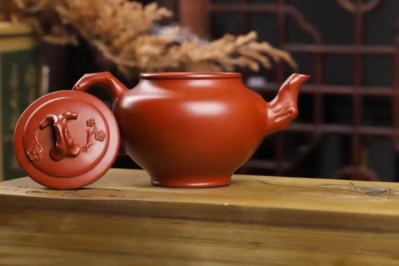 【梅报春】 泥料：大红袍 容量：280毫升