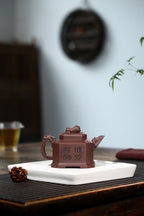 配持壶照 【八方狮球】 制壶：刘彩萍（国家级工艺美术师）原矿紫泥 容量：310cc