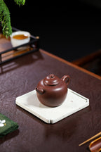 【木古龙旦】 制壶：沈梅红（国家级工艺美术师） 泥料：原矿紫泥 容量：250cc  内推球孔