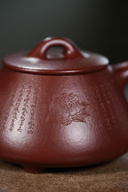 【壶名】心经石瓢 【泥料】紫袍玉砂 【容量】210cc 【作者】周良红（国家级工艺美术师）