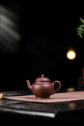 【秋水】 制壶：范俊华（国家级工艺美术师） 泥料：原矿紫泥 容量：140cc 球孔