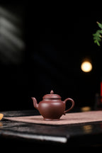 【秋水】 制壶：范俊华（国家级工艺美术师） 泥料：原矿紫泥 容量：140cc 球孔