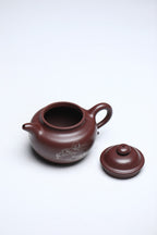 《弥勒莲子》 作者：李玮 正高级工艺美术师  原矿黄龙山紫御砂，370cc，内推球孔出水