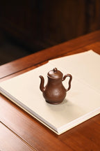 小酒壶·手工/容量150cc/极品紫泥 作品借鉴酒壶元素，雅致脱俗，巧而不纤