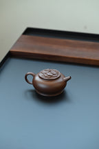 繁花·全手工 /容量200cc/原矿紫泥 腹鼓饱满，流把舒展清和