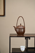 莲韵生香·全手工/正高工许学芳作品 /容量420cc/一厂紫泥 状似莲台，筋纹上下阴阳相交，层层开瓣