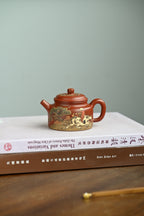 德钟· 全手工/泥绘名家全玲泥绘作品 /容量170cc/原矿朱泥 德钟壶寓意在“上德不德，是以有德”