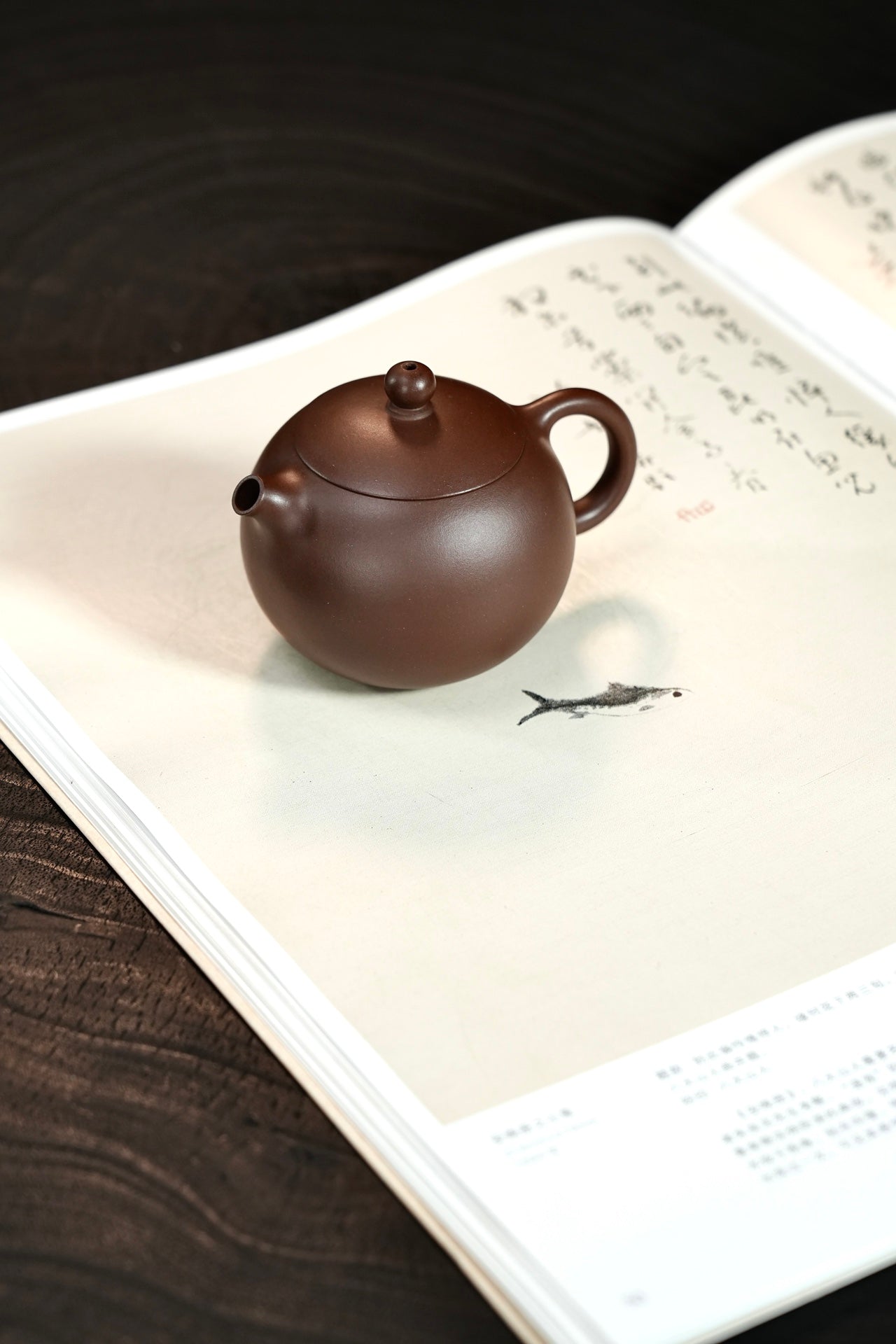 『河豚西施』老紫泥·130cc·内推7孔  体态丰腴，圆润，捺底浑然天成，极致内推，出汤利索，泥色温润，泡养油性上佳（许雪强）