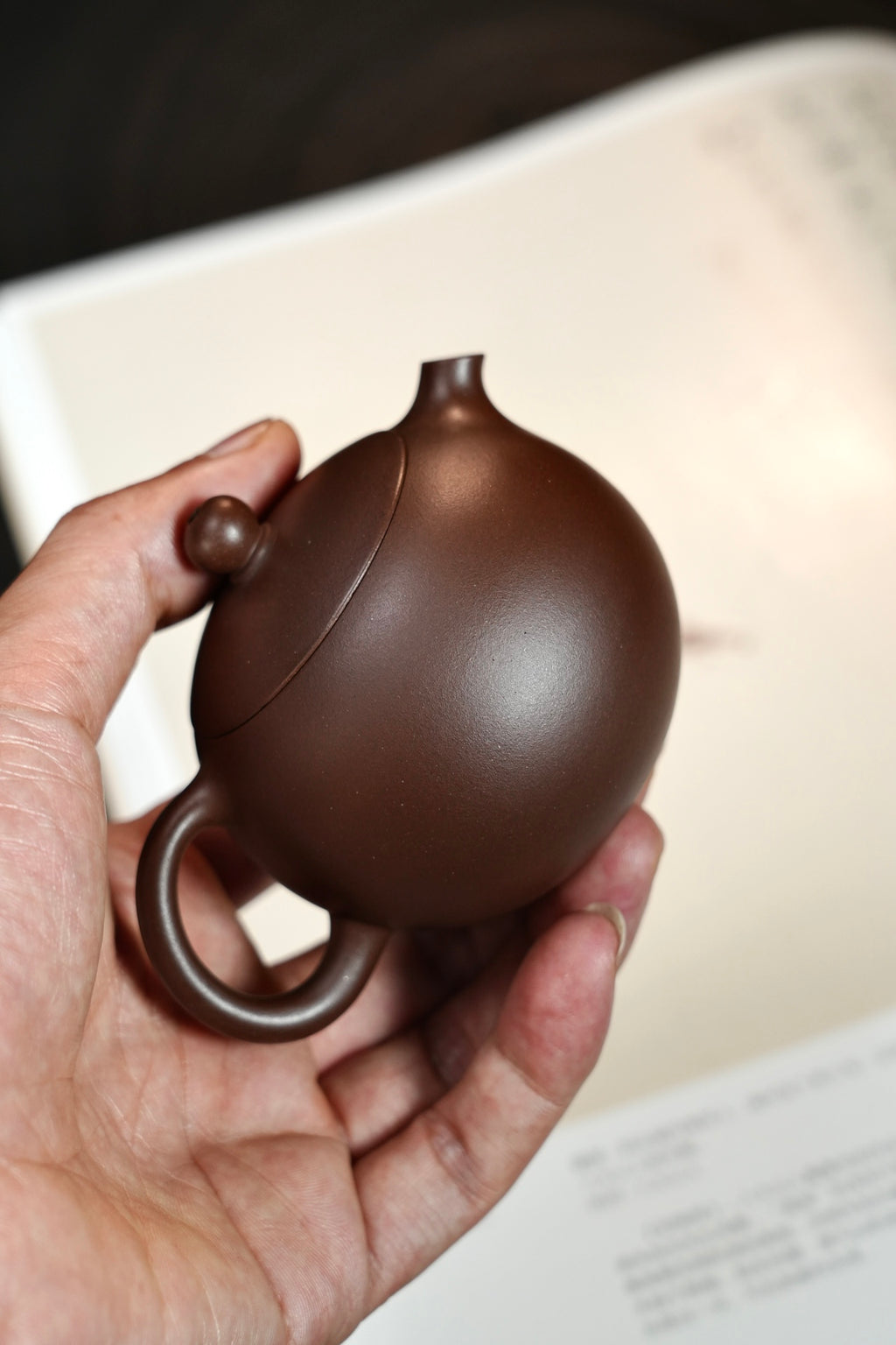 『河豚西施』老紫泥·130cc·内推7孔  体态丰腴，圆润，捺底浑然天成，极致内推，出汤利索，泥色温润，泡养油性上佳（许雪强）