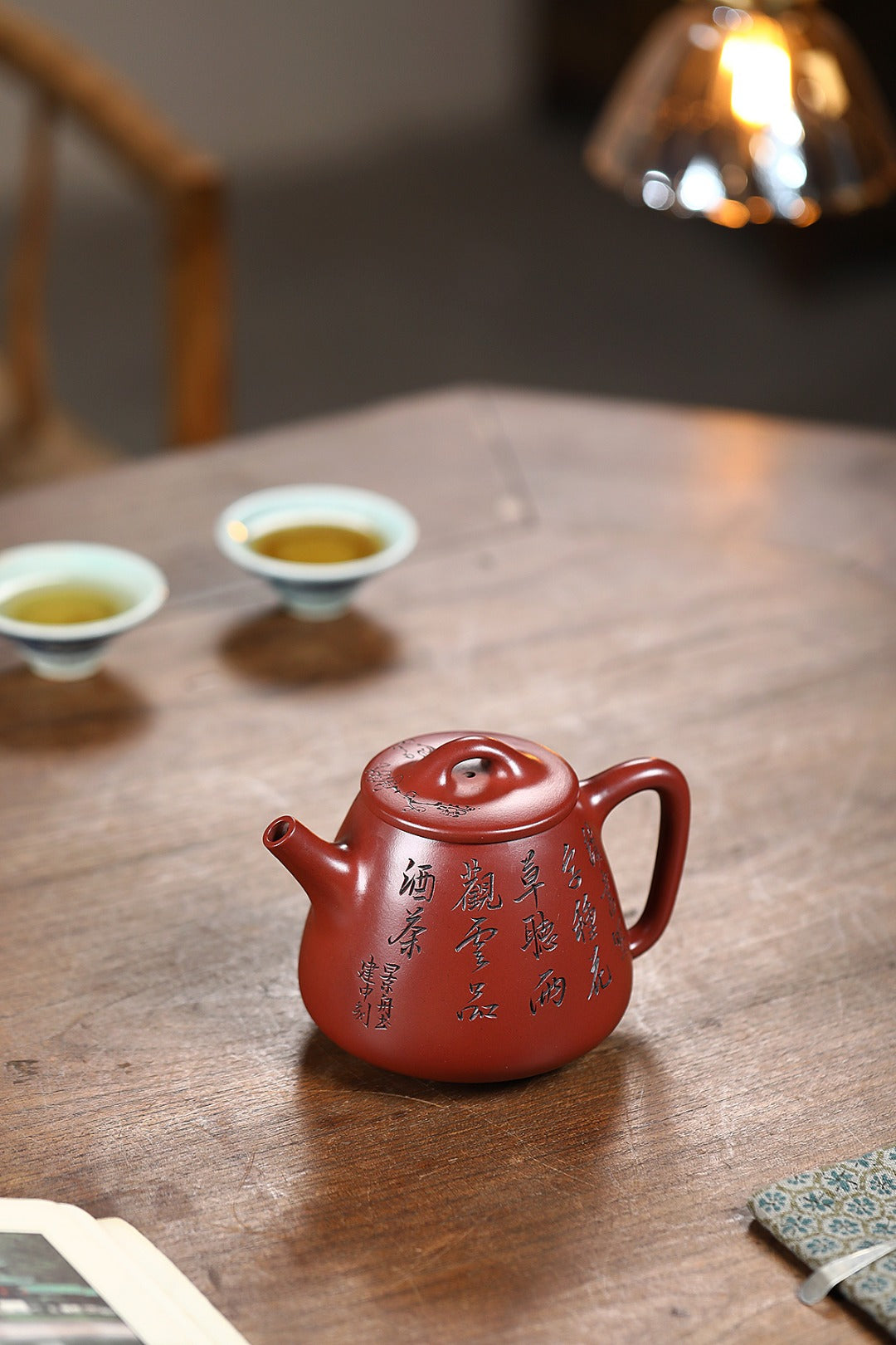 《高石瓢》 王敏（正高级工艺美术师)高建中（正高级乡村振兴技艺师） 作品简介：原矿94年三号坡龙血砂，470cc，菱形9孔出水