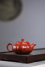 研高收藏重器【莲生】 作者：刘红仙 职称：研究员级高级工艺美术师 容量：420cc 泥料： 稀有可心朱泥