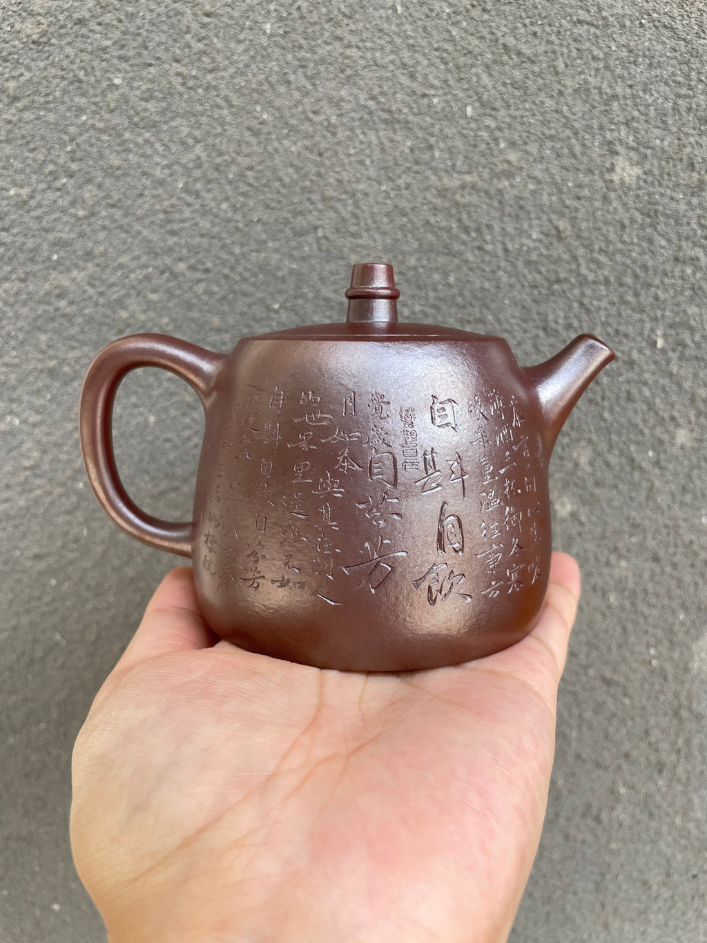 Yang Junbao ceramic teapot with intricate engravings, original zisha teapot, handmade purple clay teapot.