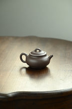 三足蕴禅·全手工 /大拍陶手金海晶作品（师承董晓勇）容量160cc/原矿青段 骨相之外，壶身丰润饱满，线条硬朗不失张力