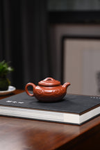 范坚【仿古如意】  原矿大红袍  290ml  范坚，“大生壶”第五代嫡传，出生于江苏宜兴陶瓷世家范家，是大生壶第五代传人
