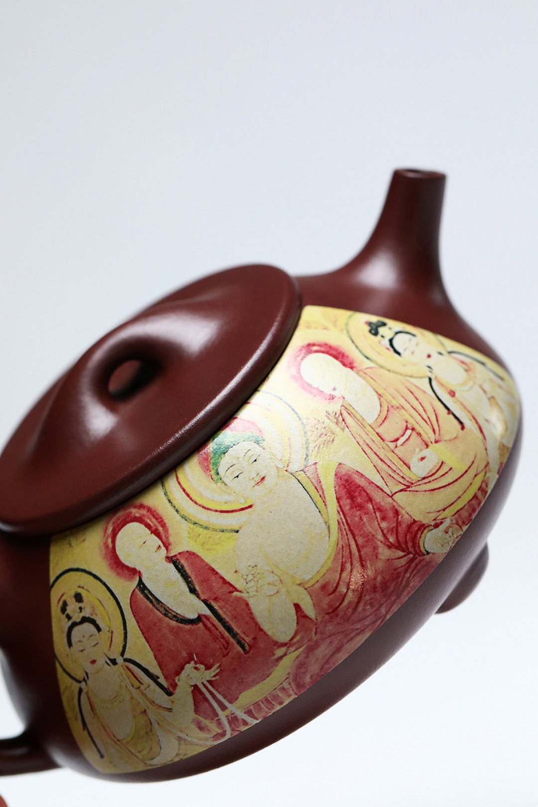 《石瓢·佛陀说法》 作者简介：李玮 中国陶瓷设计艺术大师 正高级工艺美术师 作品简介：原矿家藏紫御砂，370cc，菱形14孔出水