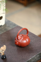 《南瓜提梁》 国家级高级工艺美术师 蒋亚平 原矿大红袍，200cc，菱形9孔出水