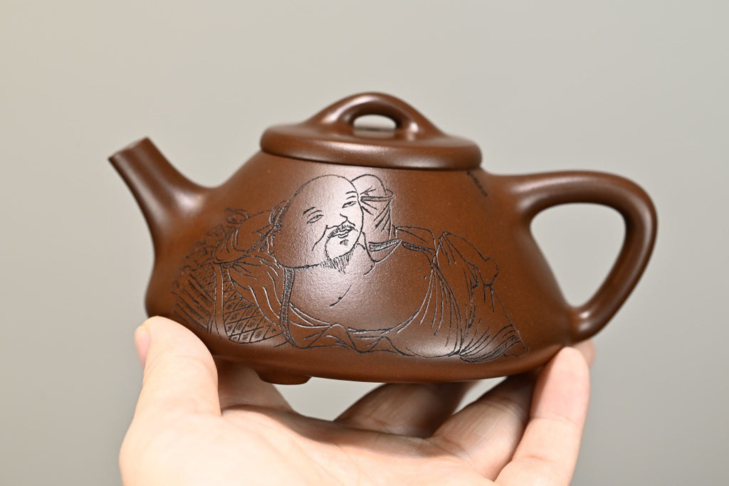 子冶石瓢·全手工/容量200cc/极品紫泥 器形具备深厚的古意，用线之单纯、凝练、清澄透明一气呵成
