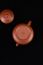 潘壶，全手工制，原矿紫泥，容量165cc，内推7孔出水  作者：实力派陶手崔松芝