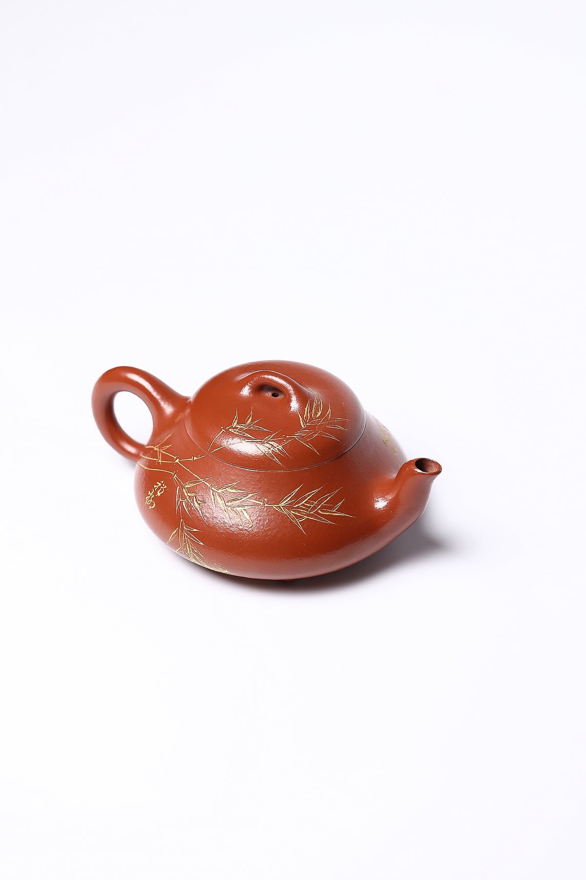 【汉棠石瓢】 作者 ：邵忠源  泥料：贵妃红朱泥 容量：300cc  作品介绍：  汉棠石瓢由徐汉棠先生优化创制，线条温润舒展，刚柔并济，是石瓢体系中的经典佳作